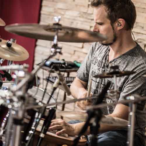 Session drummer playing Baio, a Brazilian groove on drums