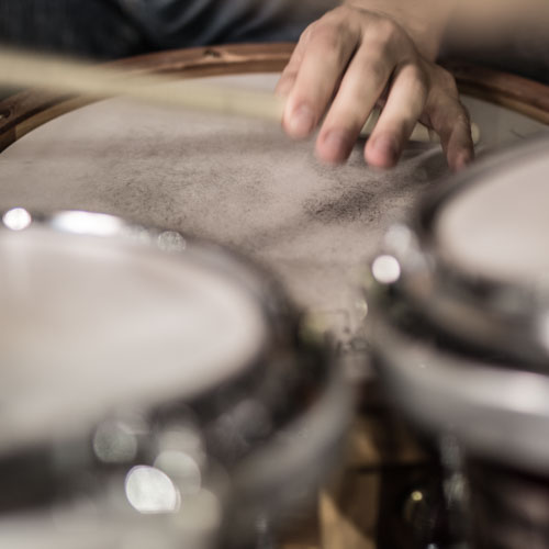 Drummer playing a cross stick on the snare drum, such as in this audio demo