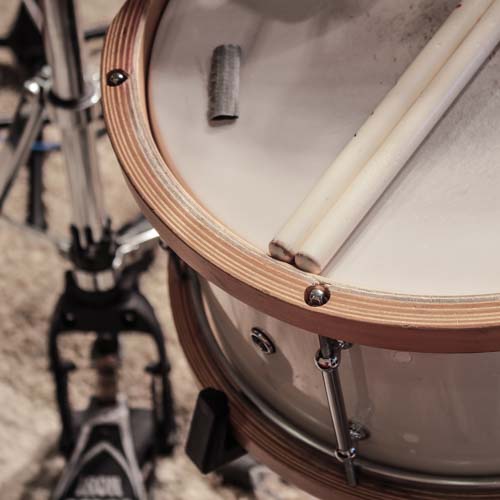 White snare drum with wooden hoops used on this Reggae one drop groove