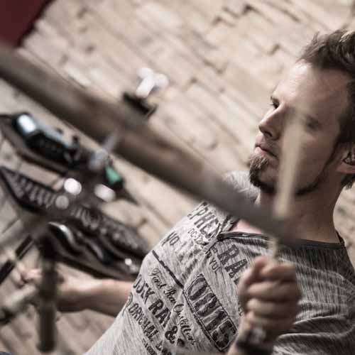 Studio drummer playing a rock groove