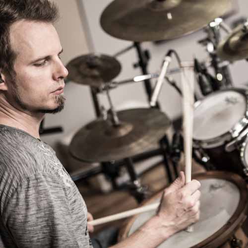 Drummer playing a slow rock groove